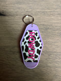 Howdy with cowprint motel keychain