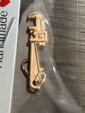 Gold wrench charm