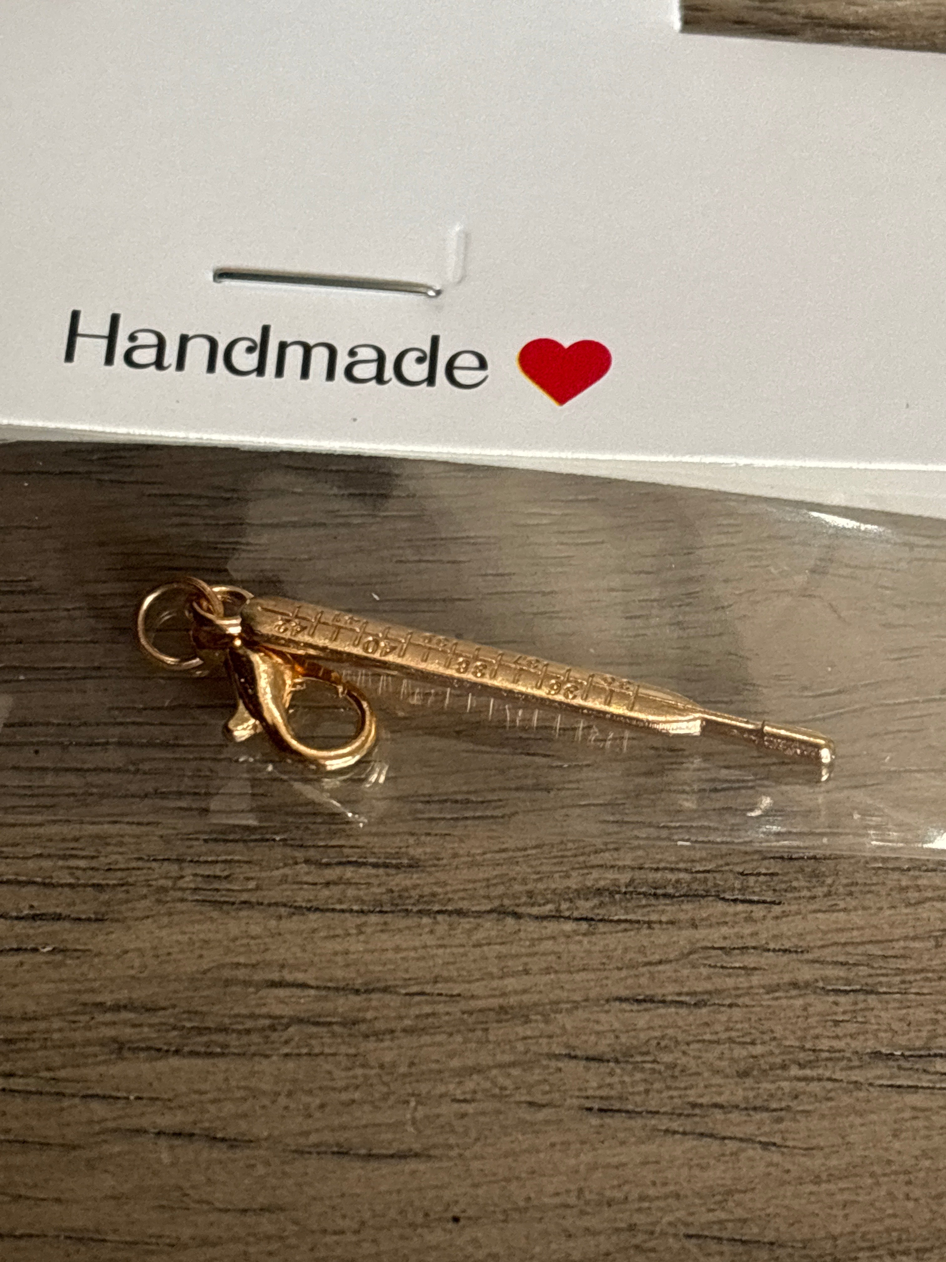 Gold thermometer charm