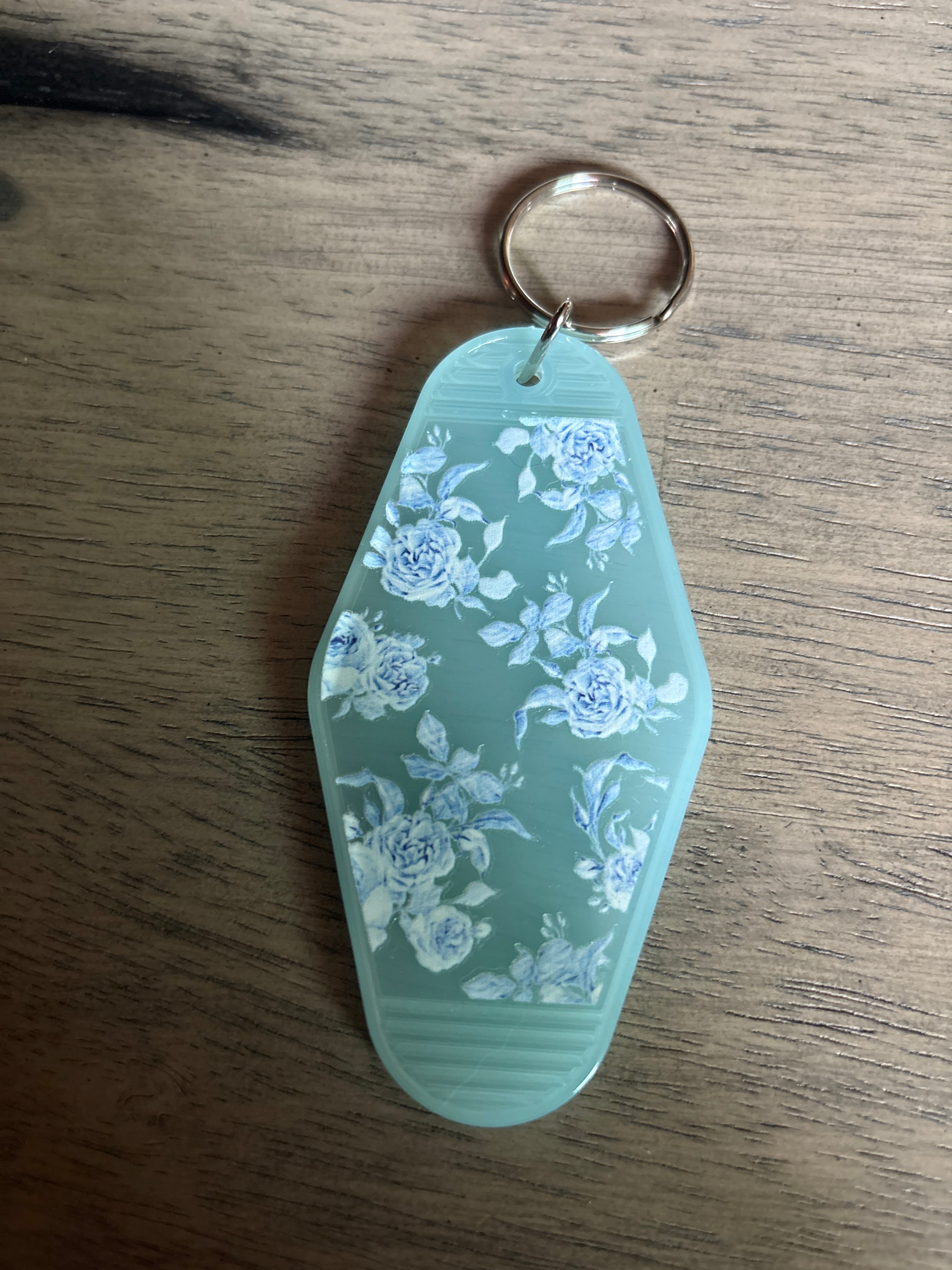Blue flowers motel keychain