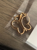 Gold butterfly charm