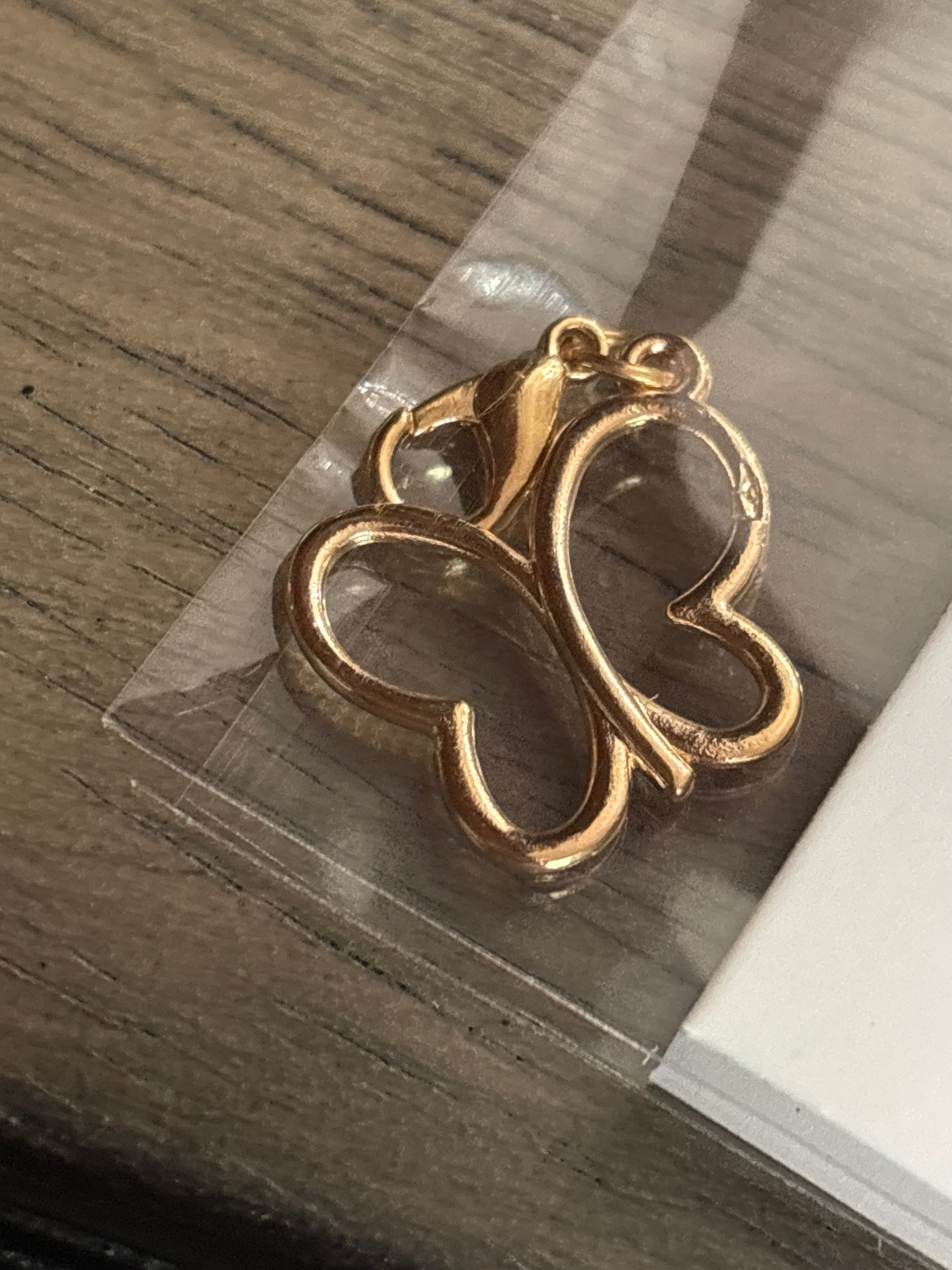 Gold butterfly charm