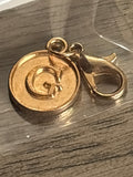 Gold G charm