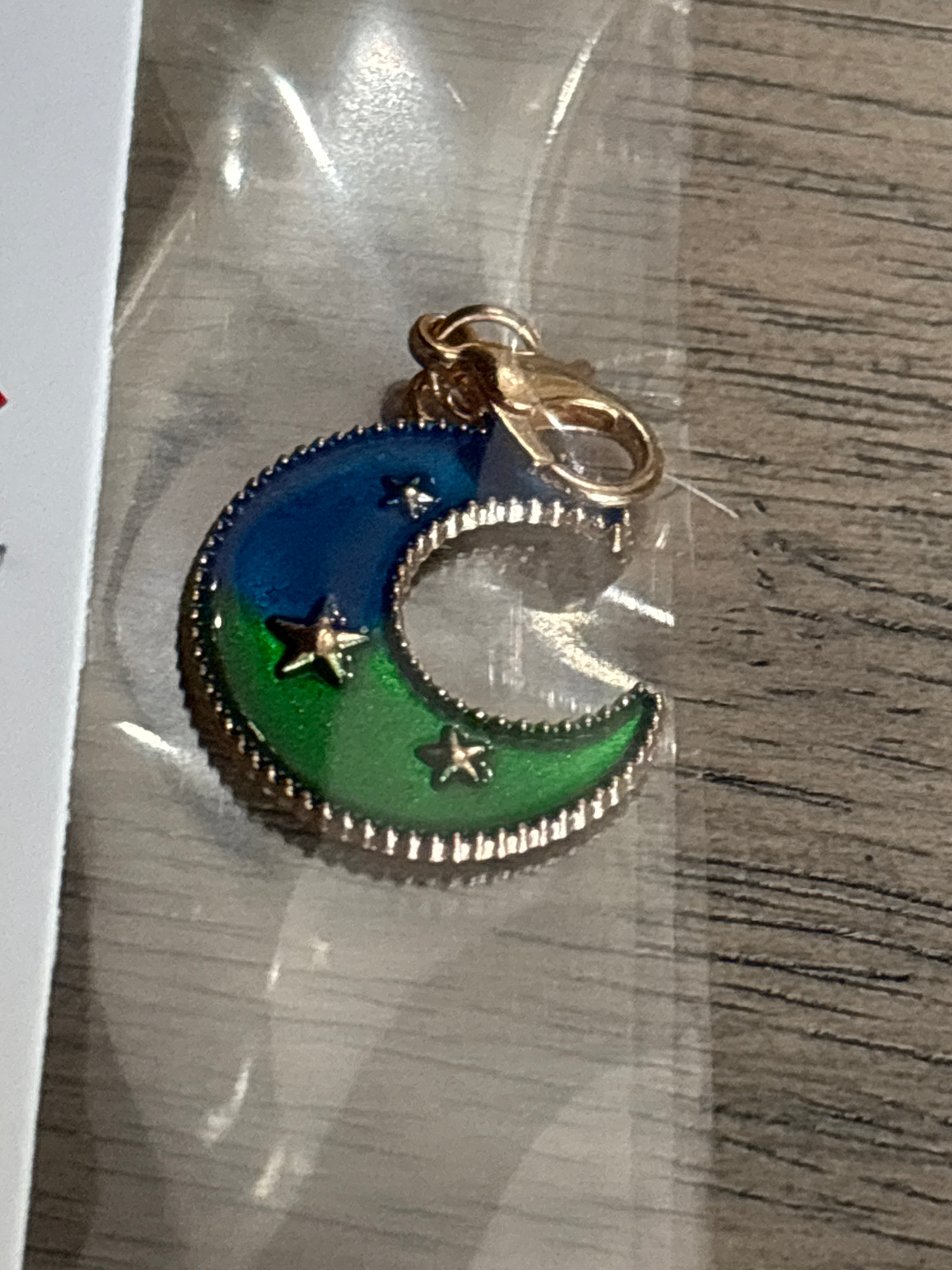 Gold moon charm