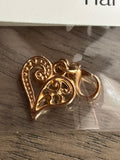 Gold heart charm