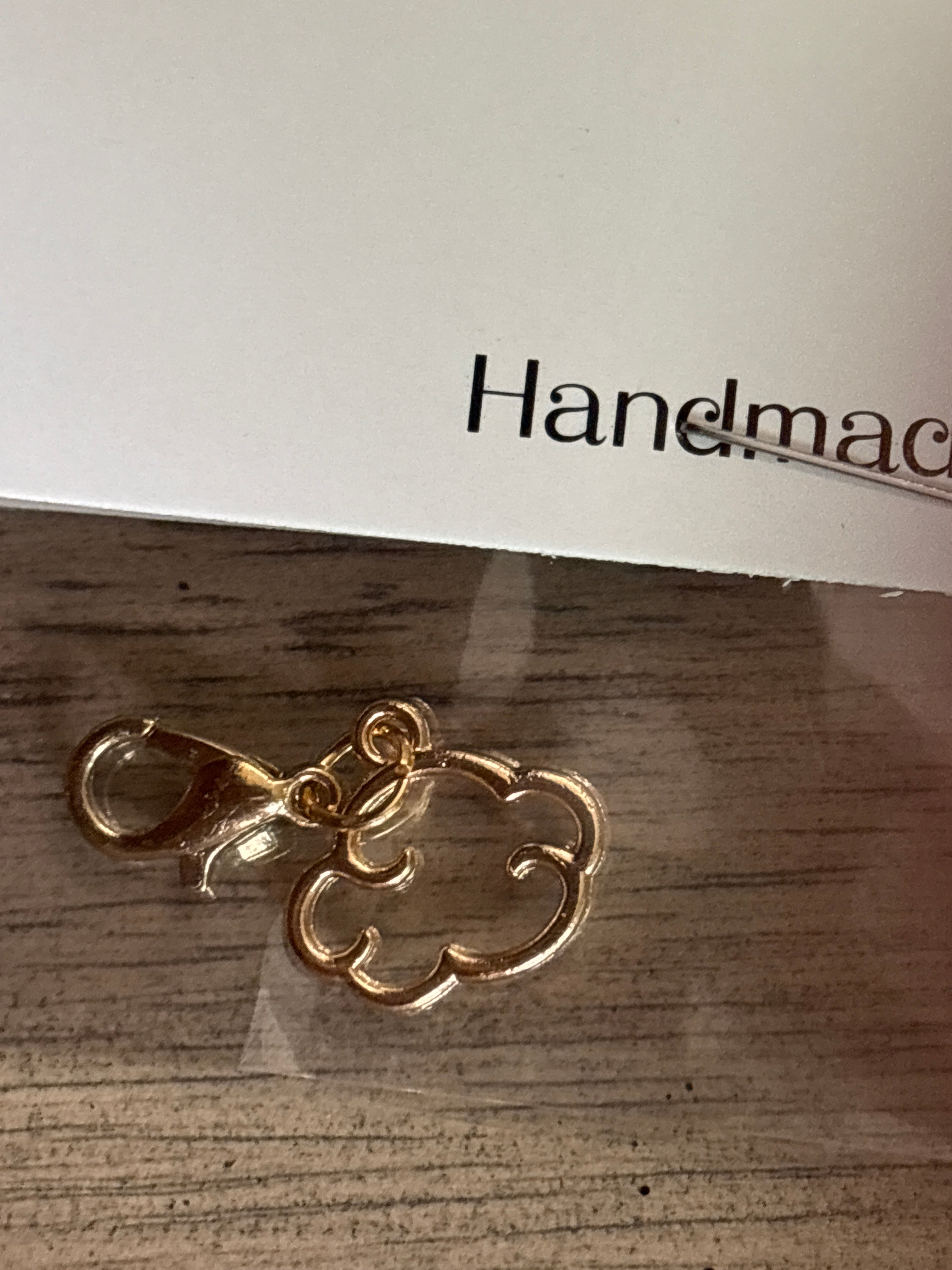 Gold cloud charm