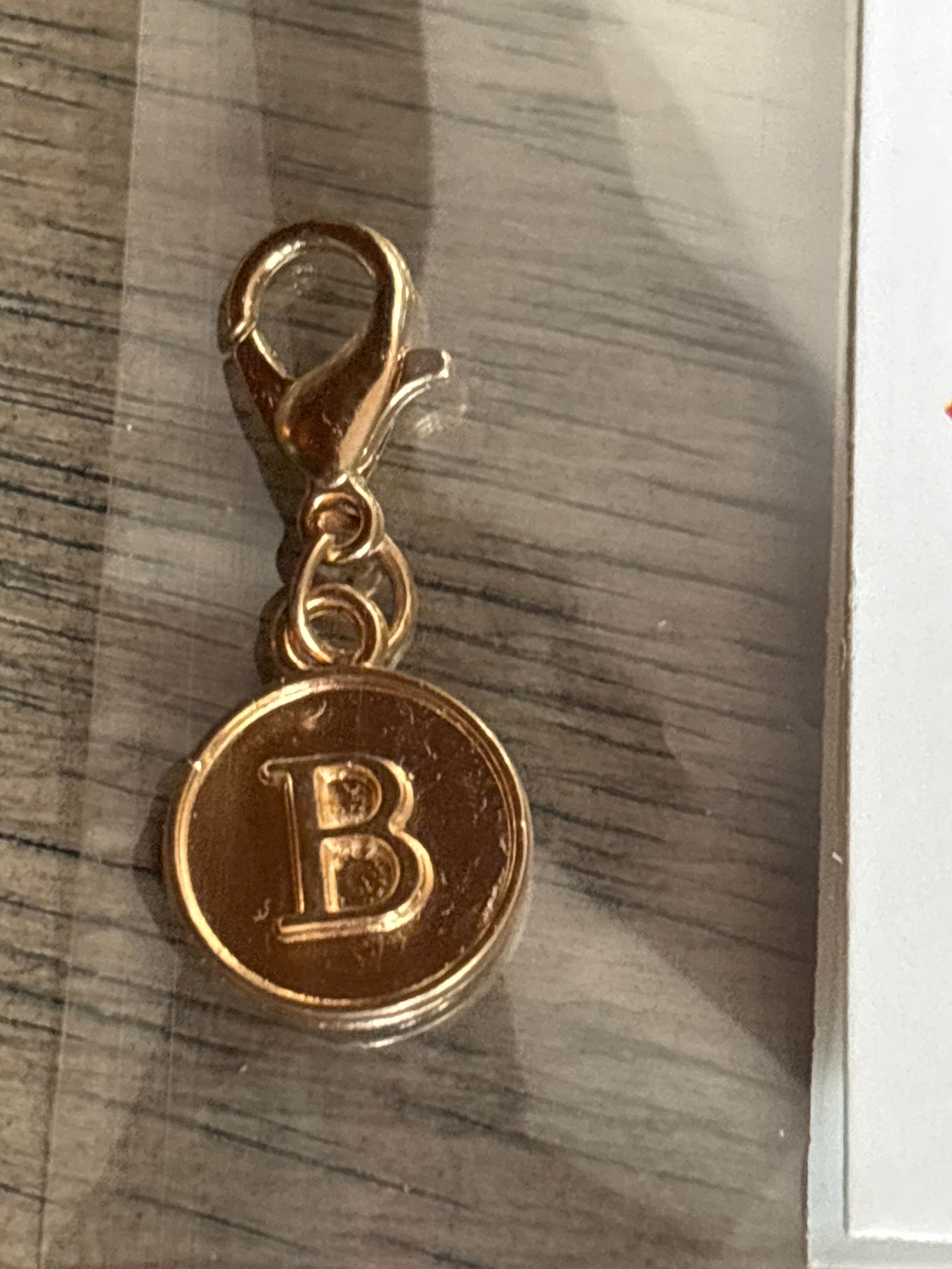 Gold B charm