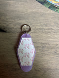 Pink flowers and bows motel keychain